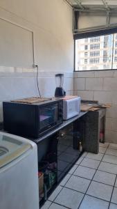 Apartamento tranquilo e perto da praia com self check-in