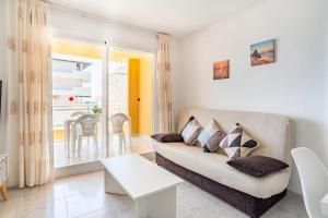 Apartamento céntrico en la playa con piscina.