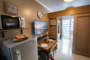 1 BR Fully Furnished Condo Shell across MOA