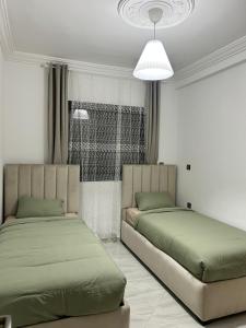 Appartement neuf 2 chambres - Parking et Mer
