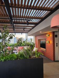 View of the monument, terrace, gym, co-working space