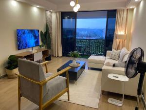 celestial suites apartment with heated swimming pool well equipped gym ample parking space children playing ground and amazing scenic views