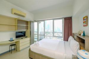 Stunning Studio Apartment at Ambassade Residences By Travelio
