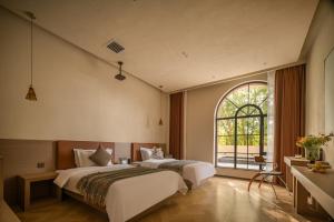 둔황 Dunhuang Muzhou OASIS Hotel 호텔 스위트룸