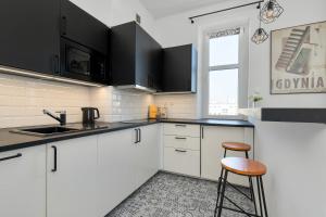 Kompaktowy Apartament w Centrum blisko Plaży Miejskiej by Noclegi Renters