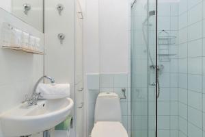 Kompaktowy Apartament w Centrum blisko Plaży Miejskiej by Noclegi Renters