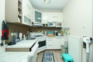 992 - Balatonőszödön közvetlen vízparti, teljes panorámás apartman