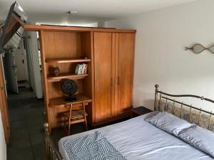 Quarto sala cozinha Praia do Canto Localização excelente na opinião 100 por cento dos hóspedes