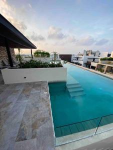 Luxury Studio Rooftop,Pool,Gym,Wifi,close to Beach