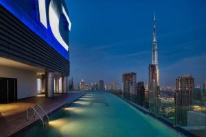 with Pool Gym 7 mins to Dubai Mall 3 King Beds
