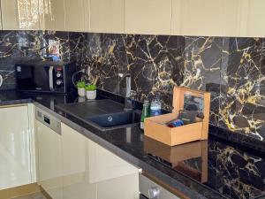 Qoople Obaapartments