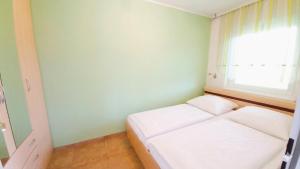 SANDRO Haus KMB Seeappartement am Ossiacher See mit direktem Seezugang und Hallenbad