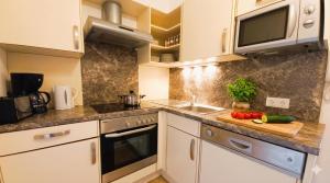 SANDRO Haus KMB Seeappartement am Ossiacher See mit direktem Seezugang und Hallenbad