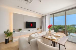 Milos High Floor 1BR with Pool Access at The Aqua