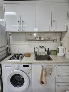 UrbanNest Stay