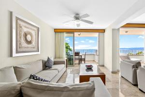 Luxury hillside suite with infinity pool, ocean views, hot tub & terrace seating