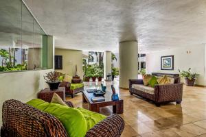 Ground-floor condo with resort pool, balcony, & pool tables