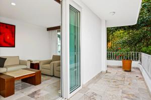 Spacious suite with wraparound terrace, rooftop infinity pool & resort amenities