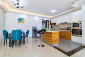 celestial stays two bedroom apartment with well equipped gym swimming pool and, ample parking space and proximity to major shopping malls