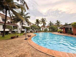 Modern 2BHK Duplex Near BagaBeach with Pool & Amenities