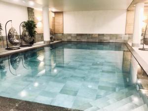 Résidence Lodge Des Neiges C - Appartement 4 pied de pistes, service hotelier inclus MAE-2581