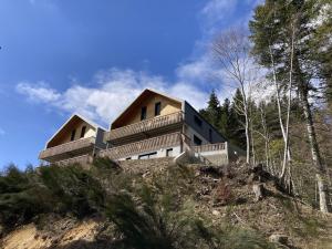 2 chambres neuf surplombant les pistes de Ski