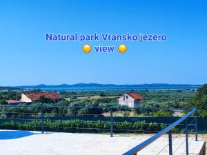 Holiday Home A&M with pool and lakeview