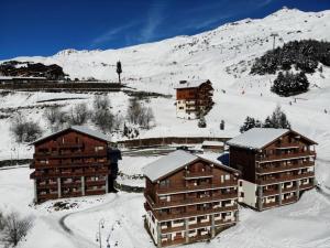 Résidence Courmayeur - Appartement chaleureux ski aux pieds pour 8 personnes MAE-3804