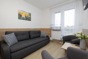 Apartamenty Blisko Plaży w Rewalu by Noclegi Renters