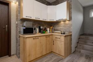 Apartamenty Blisko Plaży w Rewalu by Noclegi Renters