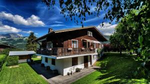 Résidence Beau Virage - Appartement de charme au pied des pistes, terrasse avec de superbes vues montagnes MAE-0234