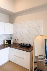 KapCasaStays Blue Haven Luxury 1BHK 30th floor