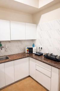 KapCasaStays Blue Haven Luxury 1BHK 30th floor