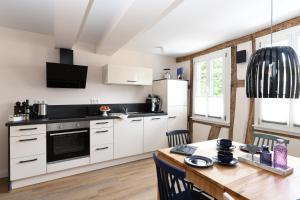 Ferienwohnung Heppenheim - Wohnung "Nibelungen"mit Dachterrasse - Das schiefe Haus