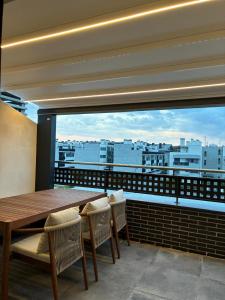 Ático nuevo con gran terraza y piscina en Llanes