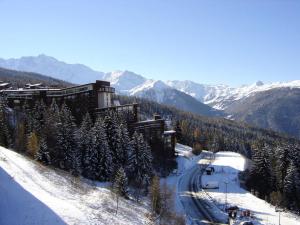 Résidence Armoise - Appartement de charme 2 pièces 6 personnes à Arc 1800 en centre station, proche des pistes et des commerces, dans le village d MAE-1694
