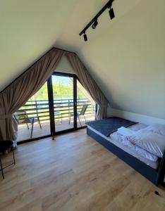 Domek nad jeziorem w Wilamowie