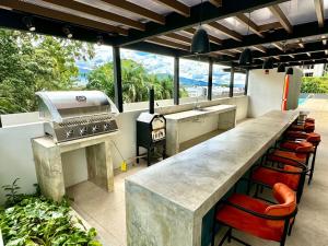 Comfort & Style Near SJO Airport Pool & Mountain Views