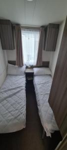 JY Holiday Caravans Wales, Oakfields Towyn Coastal Caravan Sleeps 6