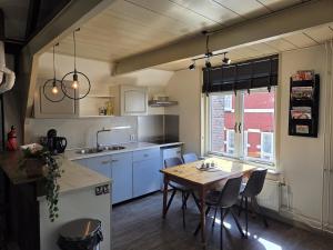 Attic apartment in historic canal house in city center Gouda