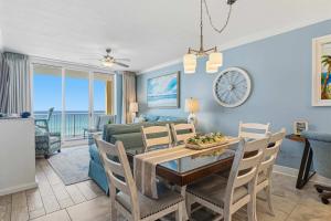 Enchanting oceanfront condo with pool balcony fitness area & washer&dryer