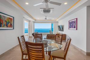 Luxurious 6th-floor condo with pool, oceanfront balcony & water view