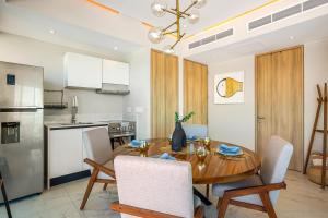 Golf-and-sea condo with panoramic oceanmountain views, pool