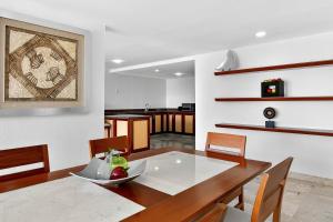 Stunning oceanview suite with cliffside infinity pool, terrace & gourmet kitchen
