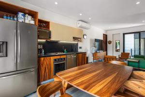 Luxury condo with shared rooftop pool and lounge, private washerdryer