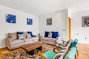 Spacious condo with near the beach with resort-style pool, inviting balcony