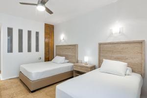 Nitta Condo # 103 Stylish condo near the beach with ocean views, on-site pool