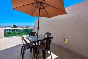 Cozy condo with loft, private balcony and gorgeous shared pool