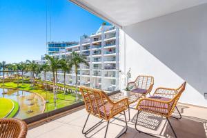 Oceanfront condo with a full kitchen, pool, & beach access