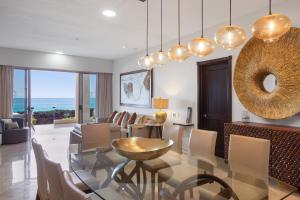 Cozy beachfront apartment with stunning ocean views and resort amenities